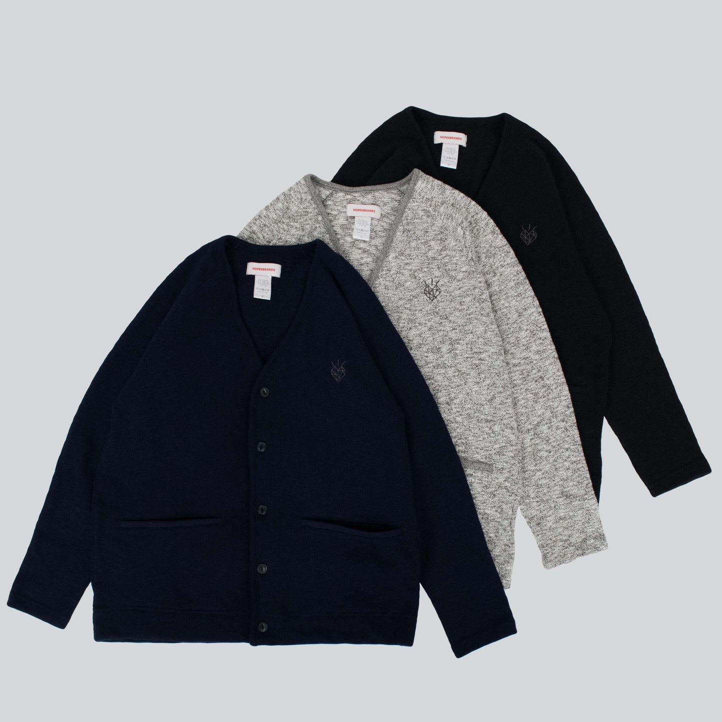 Hopes x Tieasy cardigans in black, dark navy, and mix charcoal with embroidered diamond heart logo, Hopes logo on back, and front pockets.